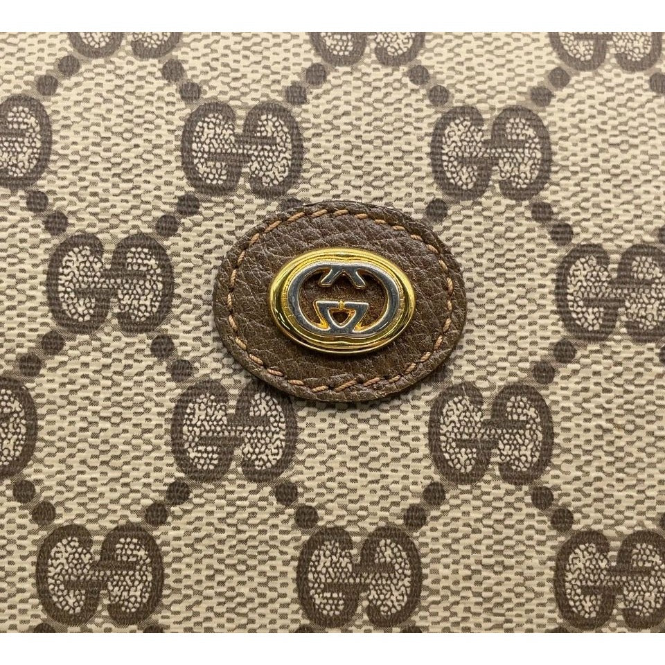 Gucci GG Supreme Monogram Brown Clutch Bag With Leather Trim - 97.01.037
